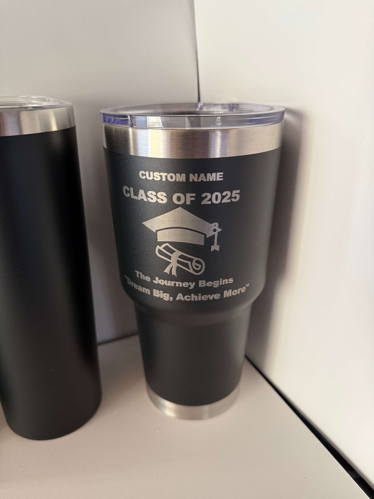 Black 32oz stainless steel tumbler engraved with “Class of 2025,” graduation cap, diploma, and space for custom name personalized graduation gift