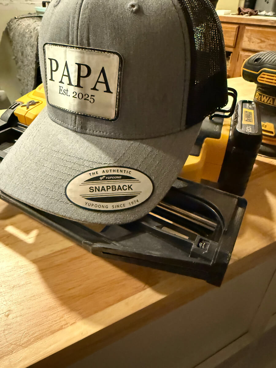 Custom trucker hat gift for dad, shown front and side patch